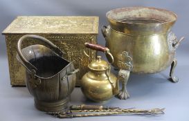 BRASS FIRESIDE GOODS - a mixed group to include a three footed cauldron type log bin with lion