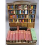 DEL PRADO SET OF 100 MINIATURE BOOKS - in an architectural style bookcase, classical titles and