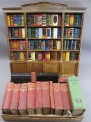 DEL PRADO SET OF 100 MINIATURE BOOKS - in an architectural style bookcase, classical titles and