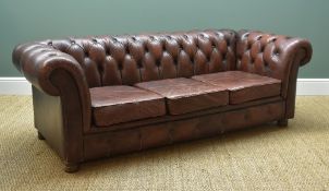 20TH CENTURY BROWN LEATHER CHESTERFIELD SOFA, with three loose cushions, 202cms wide, & an Ottoman