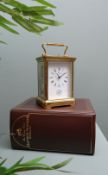 MODERN MATTHEW NORMAN GILT BRASS 8-DAY CARRIAGE ALARM CLOCK, model 1751CC, with Roman dial,