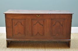 18TH CENTURY OAK COFFER, a moulded top above triple panelled front and sides with shallow carving,