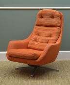 SCANDINAVIAN ORANGE UPHOLSTERED LOUNGE ARMCHAIR, c.1970s, probably Swedish, on swivel metal base