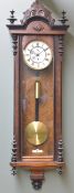 GERMAN WALNUT WALL CLOCK, Vienna regulator style, parcel ebonised and glazed case, two-piece Roman