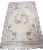 LARGE CHINESE WASHED WOOLLEN RUG & ONE OTHER - cream ground with Greek key border, central dragons