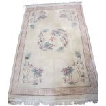 LARGE CHINESE WASHED WOOLLEN RUG & ONE OTHER - cream ground with Greek key border, central dragons