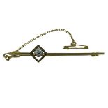 15CT GOLD SOLITAIRE DIAMOND SET BAR BROOCH - the stone 0.15ct approx, 2.8grms