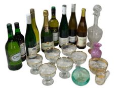 ALCOHOL - 9 bottles of wine and champagne, a glass decanter, drinking and other glassware, ETC