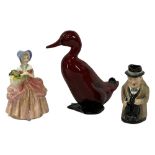 ROYAL DOULTON FLAMBE DUCK - 16cms tall, Winston Churchill Toby jug, 10cms tall and figurine 'Dissie'