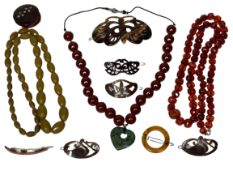 FACETED AMBER BEAD NECKLACE, two other amber necklaces and a collection of faux tortoiseshell hair
