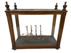FOUR MASTER MODEL SHIP - in a vintage glass and oak case, 34cms H, 36cms W, 16cms D