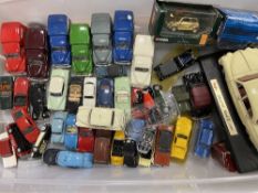 DIECAST MODEL VEHICLES to include Corgi, Solido, a Maisto Jaguar on a plinth, a quantity of Morris