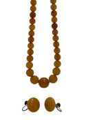 SINGLE STRAND AMBER BEAD NECKLACE - with 9ct gold clasp and a pair of earrings similar in