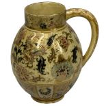 A ZSOLNAY PECS JUG - with floral decoration, 23cms tall