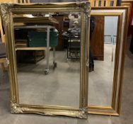 MIRRORS - two oblong bevelled glass gilt framed wall mirrors, 106 x 76cms the largest