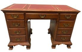 ANTIQUE MAHOGANY DESK with three sectioned tooled effect leather top, twin pedestal with central