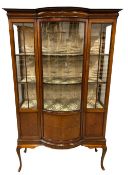 QUALITY EDWARDIAN MAHOGANY CHINA CABINET with single door and bow front on splayed supports,