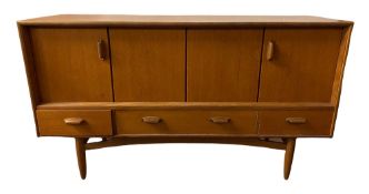 G-PLAN MID CENTURY TEAK SIDEBOARD with bi-fold opening doors above three drawers, 81cms H, 145cms W,