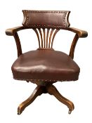 VINTAGE OAK OFFICE SWIVEL CHAIR on castors with rexine and studded seat, 88cms H, 56cms W, 46cms D
