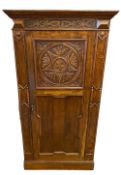 CIRCA 1900 HALL ROBE with single door and carved front, 187cms H, 97cms W, 48cms D