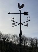 WROUGHT IRON WEATHER VANE having 'N', 'S', 'E' and 'W' pointers and a cockerel arrow, the column