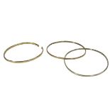9CT GOLD LADY'S BANGLES (2) - a solid example stamped '375' (cut) and a dual foldover hollow core,