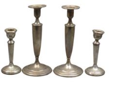 SILVER CANDLESTICKS, 2 PAIRS - the taller pair marked 'Sterling', 23cm heights, 17.7 ozt, the