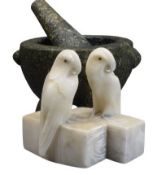 GRANITE TYPE PESTLE & MORTAR and a pair of carved alabaster parrot bookends, 14.5cm heights