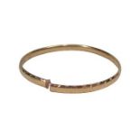 9CT ROSE GOLD LADY'S BANGLE - solid with edge decoration (cut), 19.8grms