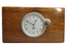 SMITHS AUTOMOBILE CLOCK - mounted within a polished wood block, 9cms clock diameter, 13 x 23 x