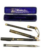 VINTAGE PENS (3 and a pencil) including the Swan pen with gilt metal mounts and hanging chain in a