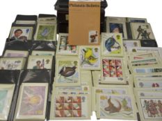 STAMPS - PHQ cards, the majority unused. Also, Philatelic bulletins in binders (approximately 60)