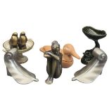 HEAVY SCROLLED METAL BOOKENDS, A PAIR, a composition figurine of a seated nude lady, a green