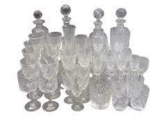 CUT & OTHER DECANTERS & STOPPERS with a mixed quantity of similarly style drinking glassware