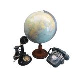 TELEPHONES - an old circular based 'microphone on stand' telephone, a conventional handheld