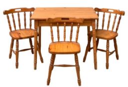 MODERN PINE BREAKFAST TABLE, 76cms H, 91cms W, 68cms D and three chairs, 78cms H, 39cms W, 33cms D