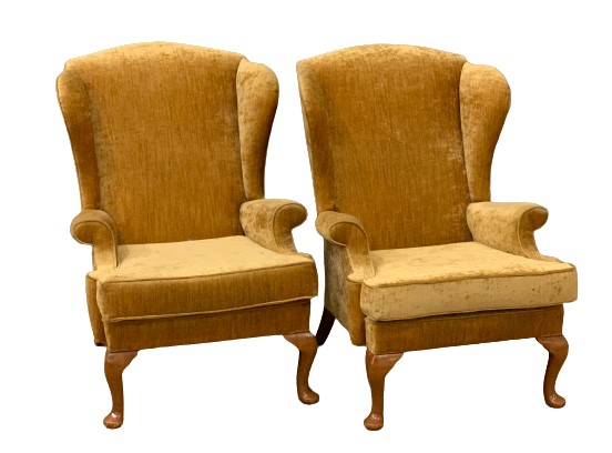 VINTAGE WING BACKED ARMCHAIRS, a pair, in mustard coloured upholstery, 102cms H, 75cms W, 50cms D