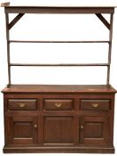 CIRCA 1900 OAK DRESSER having an open rack and a base with three drawers above three doors, 208cms