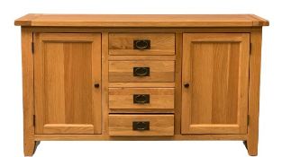 MODERN LIGHT OAK SIDEBOARD, four drawers flanked by two end cupboards, 85cms H, 150cms W, 45cms D