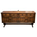 LINENFOLD OAK SIDEBOARD - four drawers over four cupboard doors, 87cms H, 188cms W, 49cms D