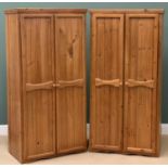 MODERN PINE BEDROOM FURNITURE - a pair of two door wardrobes, 182cms H, 92cms W, 53cms D