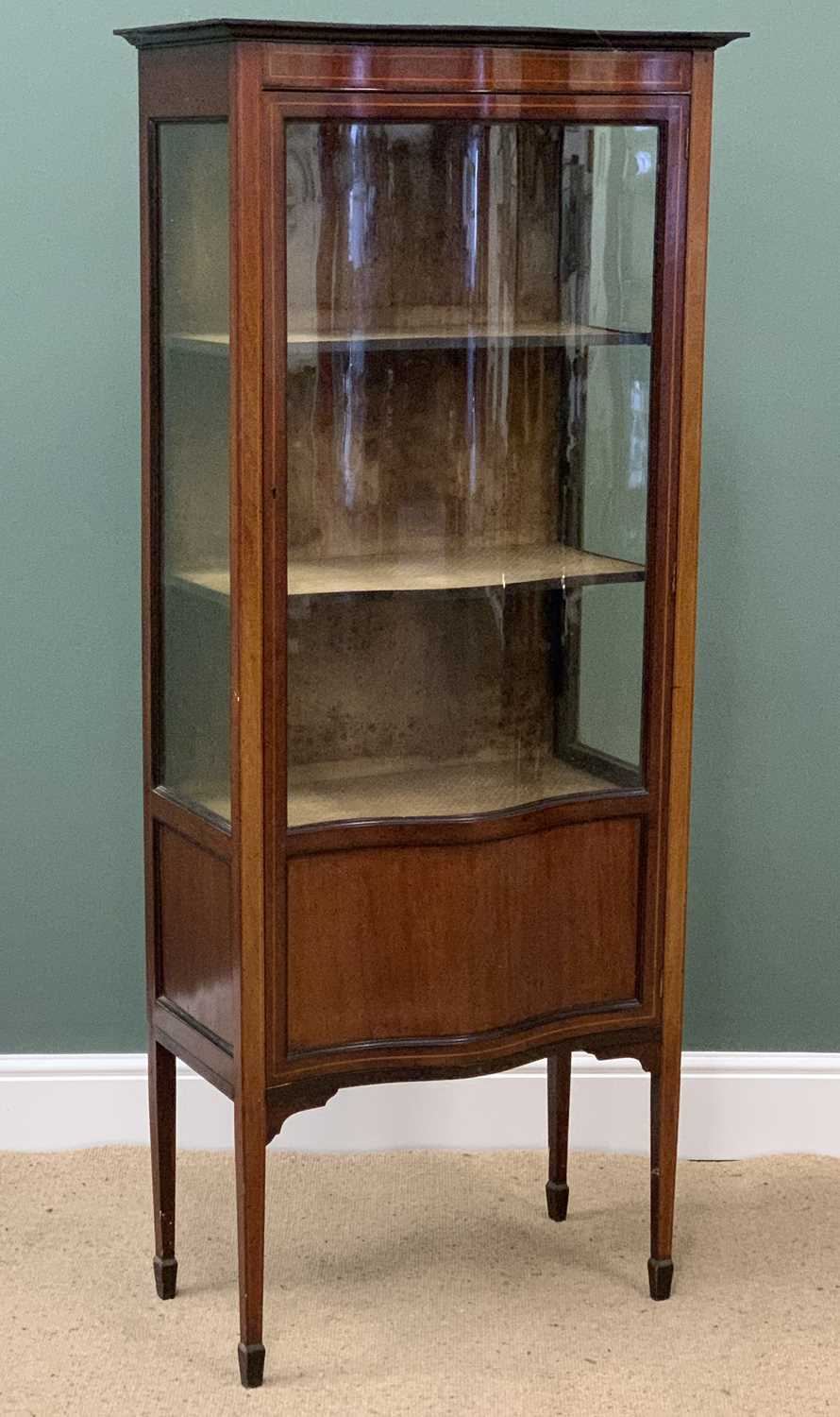 EDWARDIAN MAHOGANY INLAID DISPLAY CABINET on tapered supports and spade feet, with serpentine front,