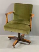 VINTAGE OAK UPHOLSTERED OFFICE ARMCHAIR, swivel, rise and fall action, in green velour upholstery,
