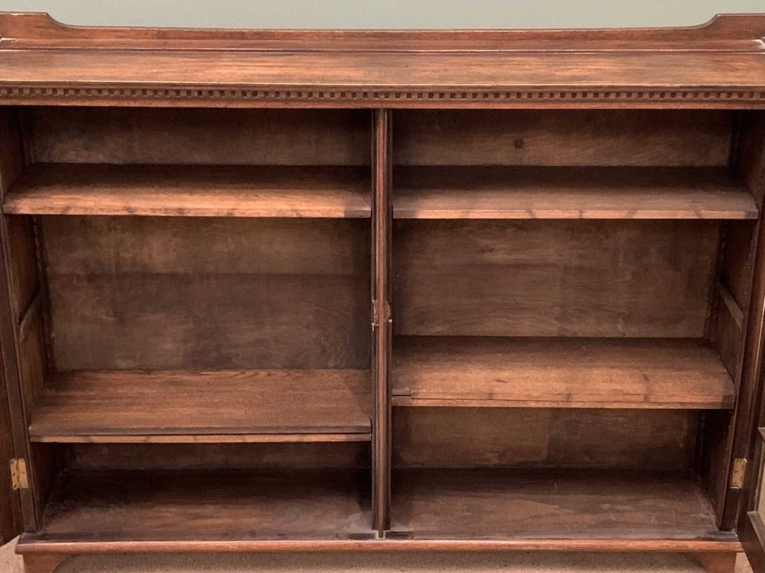 BOOKCASE CUPBOARD in polished oak with twin astragal glazed doors and dentil cornice, 106cms H, - Image 4 of 5