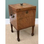 ANTIQUE WALNUT CELLARETTE with brass handles, on reeded tapered supports, spade feet and castors,