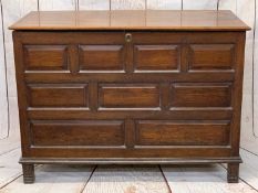 ANTIQUE OAK LIDDED COFFER, the peg joined constructions having a moulded edge top and multi-