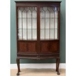 QUALITY BOW FRONT DISPLAY CABINET - antique mahogany with twin glazed doors, carved plinth and apron