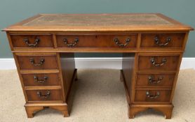 REPRODUCTION DESK in mahogany and yew effect, twin pedestal with tooled leather effect top, 78cms H,