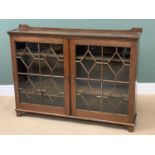 BOOKCASE CUPBOARD in polished oak with twin astragal glazed doors and dentil cornice, 106cms H,