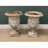 GARDEN STONEWARE - a pair of good sized urns on square bases, 77cms H, 62cms diameter